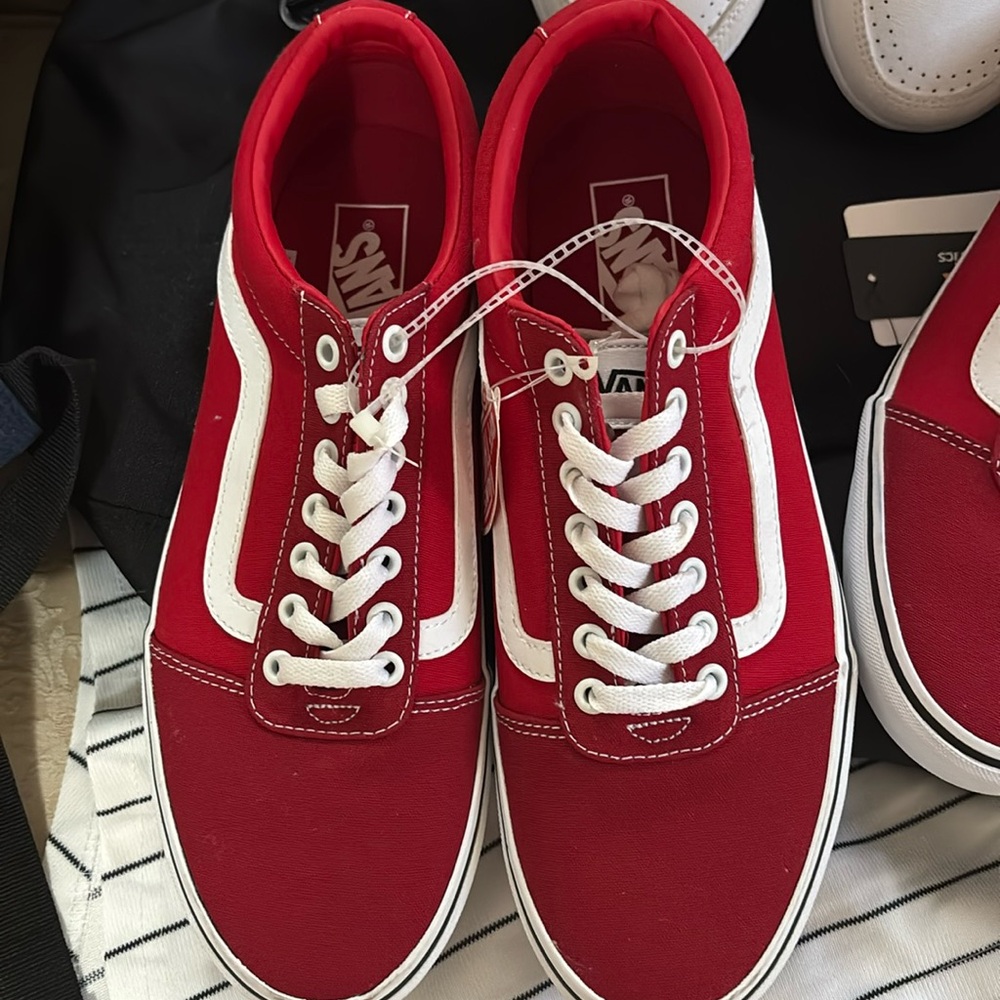 Brand new Vans tennis shoes never worn have two size 10’s and one 10.5